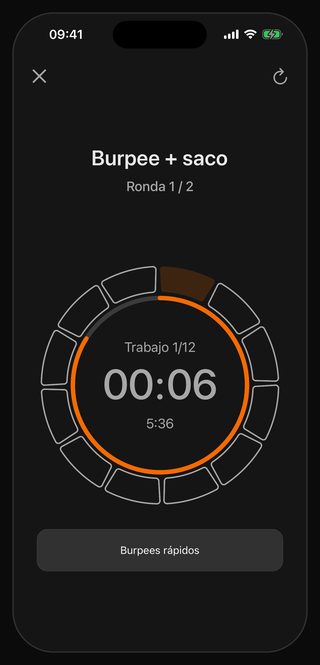 El temporizador de Bell en marcha: Burpee + saco, Ronda 1 / 2, Trabajo 1/12, 00:06 en el centro, 5:36 justo debajo y, al pie, Burpees rápidos