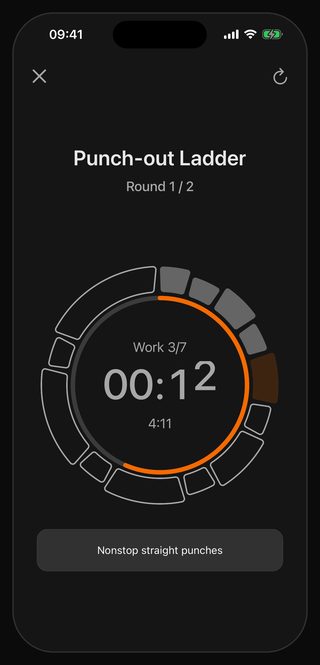 The Bell timer running Punch-out Ladder: round 1 of 2, work interval 3 of 7, 12 seconds left, the cue underneath reading Nonstop straight punches