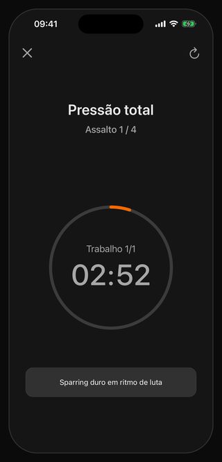 O timer do Bell rodando Pressão total: Assalto 1 / 4, Trabalho 1/1, 02:52 no relógio grande e, na faixa de baixo, Sparring duro em ritmo de luta