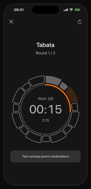 The Bell timer running Tabata: round 1 of 3, work interval 2 of 8, 15 seconds left, the cue underneath reading Fast nonstop punch combinations